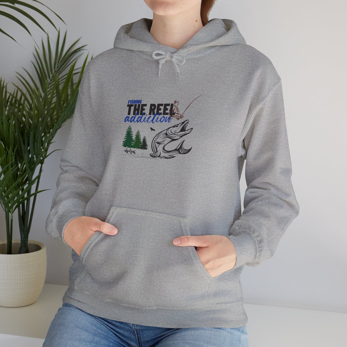 Reeling the Addiction Unisex Heavy Blend™ Hooded Sweatshirt. A Humorous Gift for fishermen or anyone who loves the outdoors.